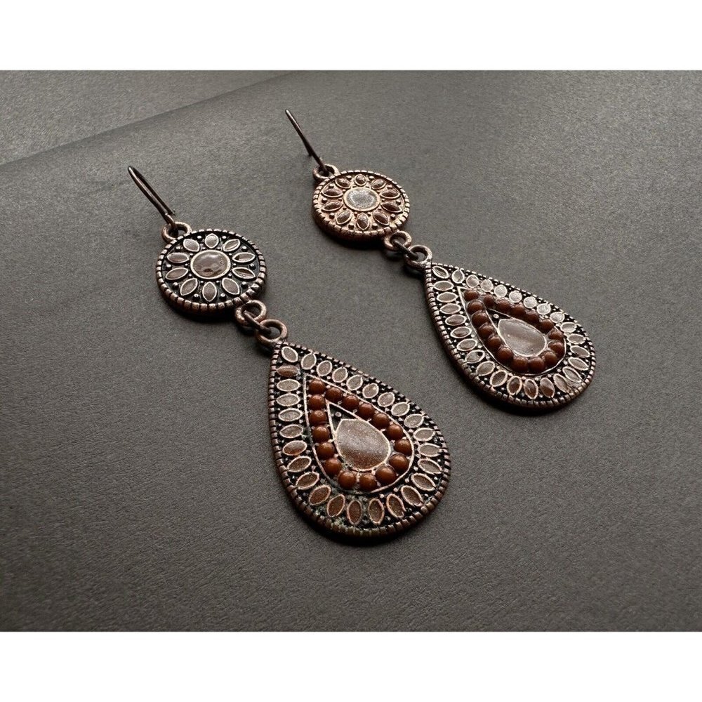 Franceska’s Stamped Teardrop earrings with light brown details 2”